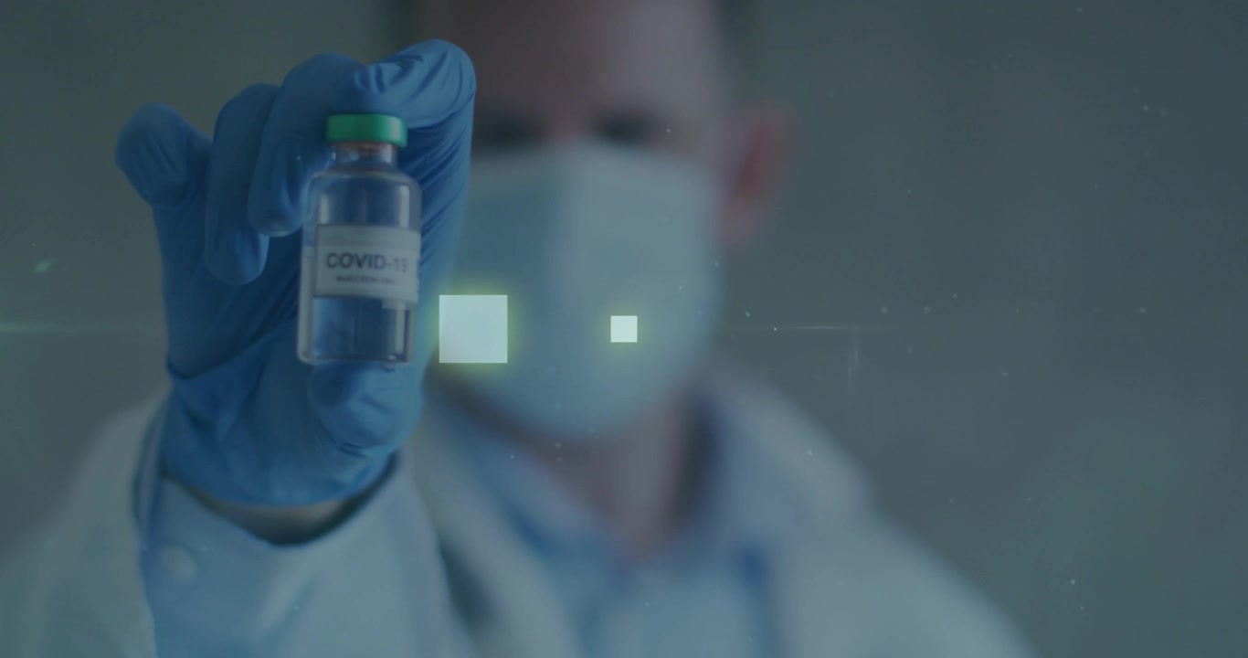 Doctor lifting COVID-19 vaccine vial with gloves for digital scanning via green overlays