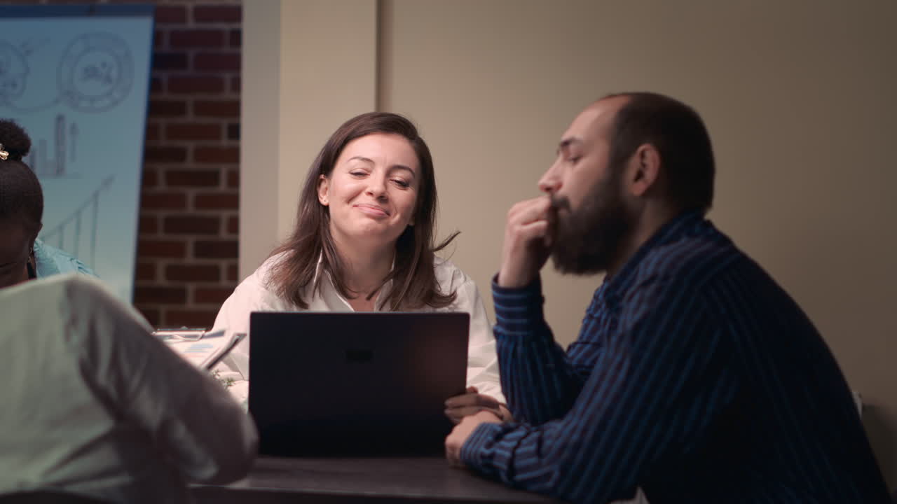 Project manager talking with employee in business meeting portrait