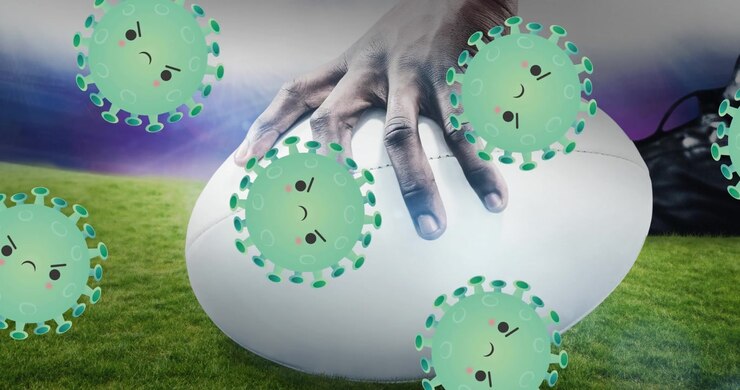 Palla da rugby su campo circondata da icone di virus animate