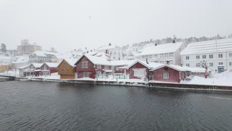 waterfront village during winterly day in kragero, norway