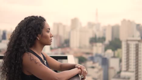 beautiful black woman  at the balcony