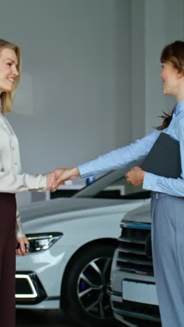 car dealership handshake