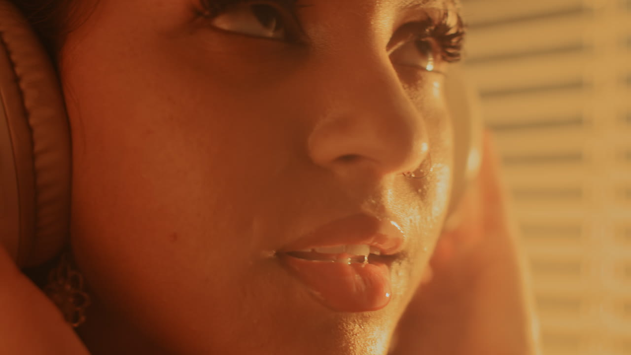 Gen Z Woman Closing Eyes while Enjoying Chill Music