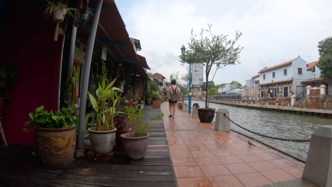 (Slow-Mo) Girl Walking on Malacca Jonker River Walk