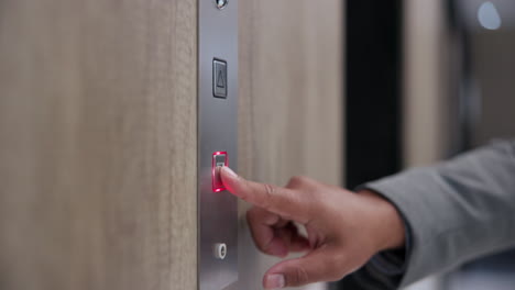 pressing an elevator call button
