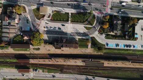 top down view over a high traffic road and a train railway, reda town in poland