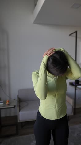 woman stretching at home