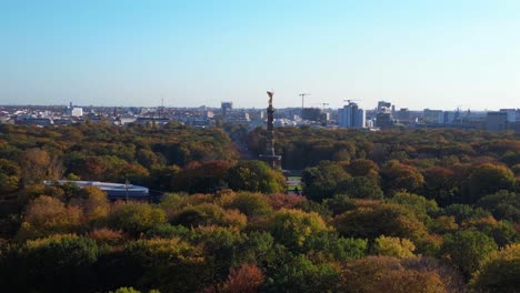 aerial view of the victory column in berlin's tiergarten park during autumn
