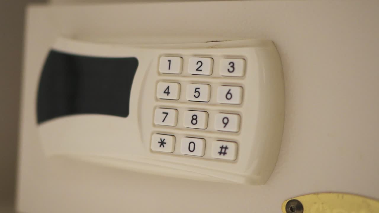 Close-up of digital safe keypad with numeric buttons for added personal security.