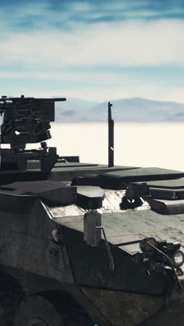 close-up of a military armored vehicle in a desert landscape