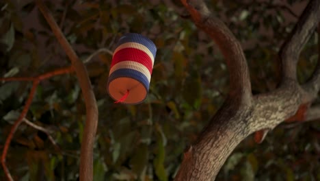 traditional costa rican lantern with flag pattern hanging from tree