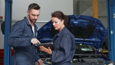 mechanics overhauling an engine