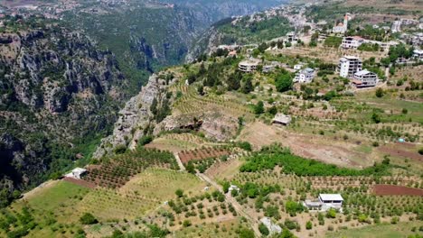 hill town of bsharri and kadisha valley in lebanon - aerial drone shot