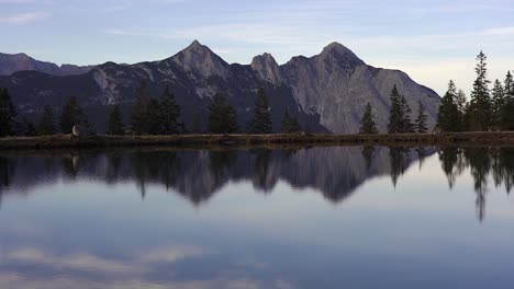 zoomed-in-view-of-Kaltwassersee,-an-alpine-lake-reflecting-the-mountains-of-the-alps,-near-Seefeld-in-Tirol-in-Austria