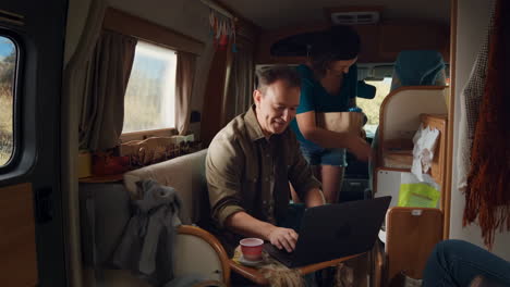 people working in a van