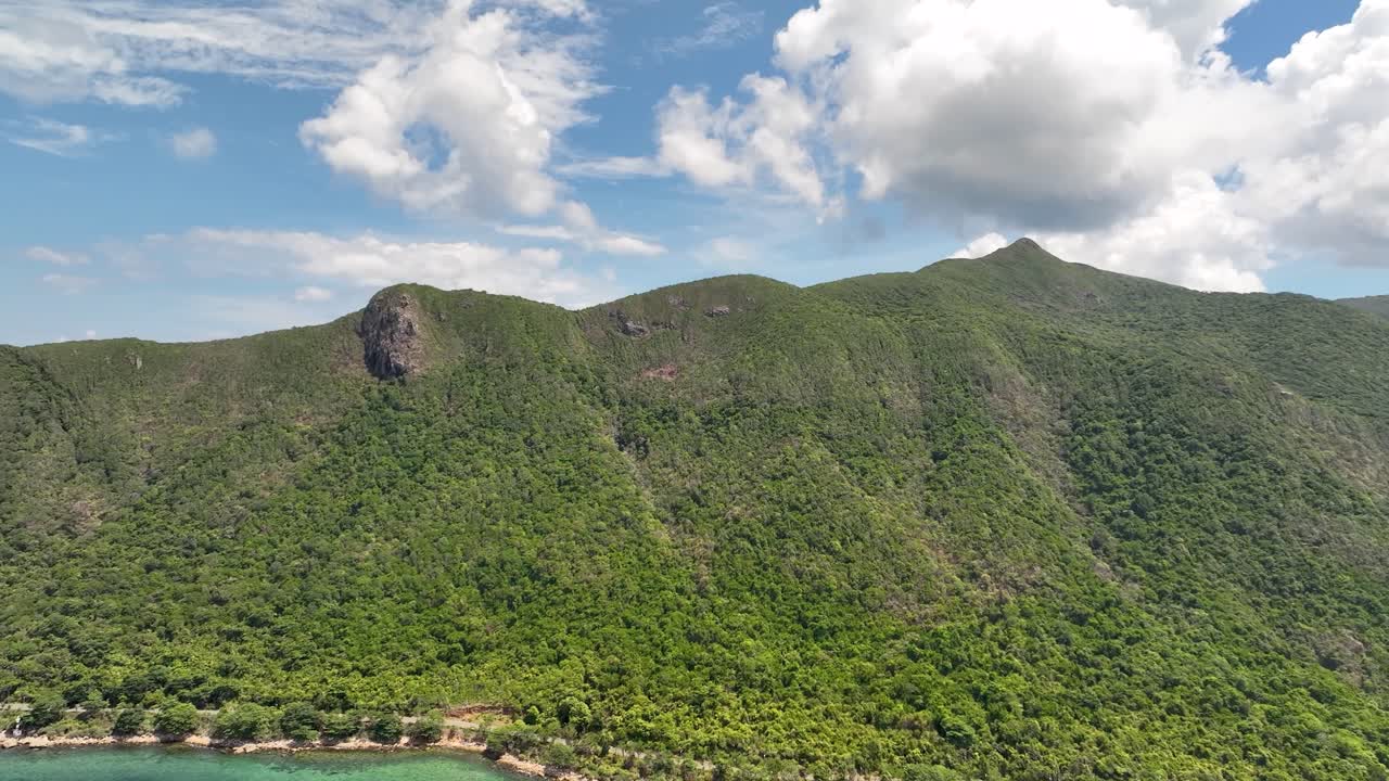 Tropical Paradise With Densely Forest-Covered Mountainscape In Con Dao Island, Vietnam. Aerial Drone Shot