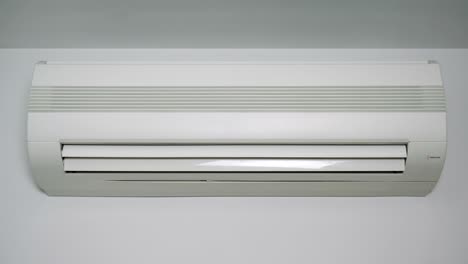 front view at an operating air conditioner. (loop ready video)