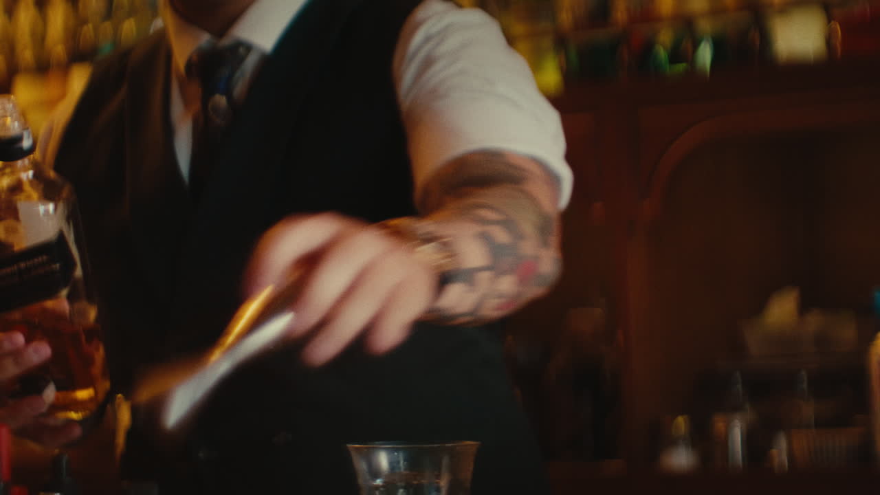 Bartender Preparing a Cocktail with Black Label Whiskey