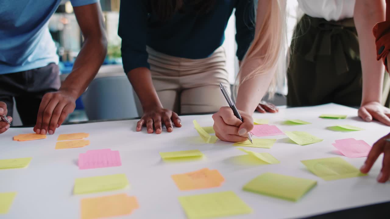 Young coworkers sharing concepts together