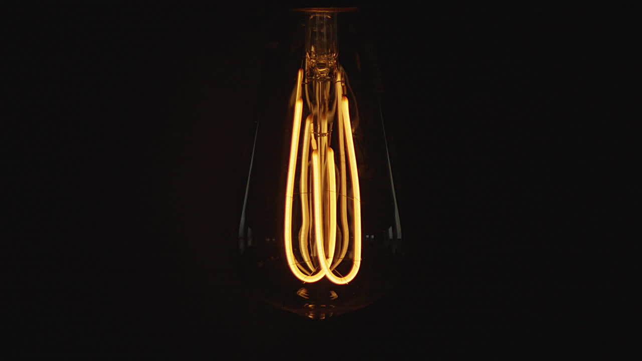 Vintage lightbulb dimming on and off