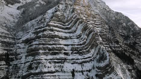 tilt shot of snowy, jagged mountain face in provo canyon utah