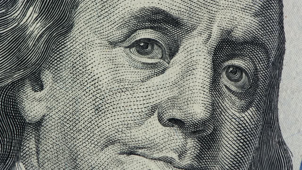 Nærbilde av amerikanske dollar-sedler. Inntekts- og forretningskonsept