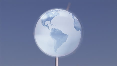 animation of globe over wind turbine