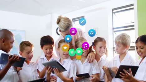 Animation-of-colorful-icons-over-diverse-schoolchildren-and-teacher-using-tablets