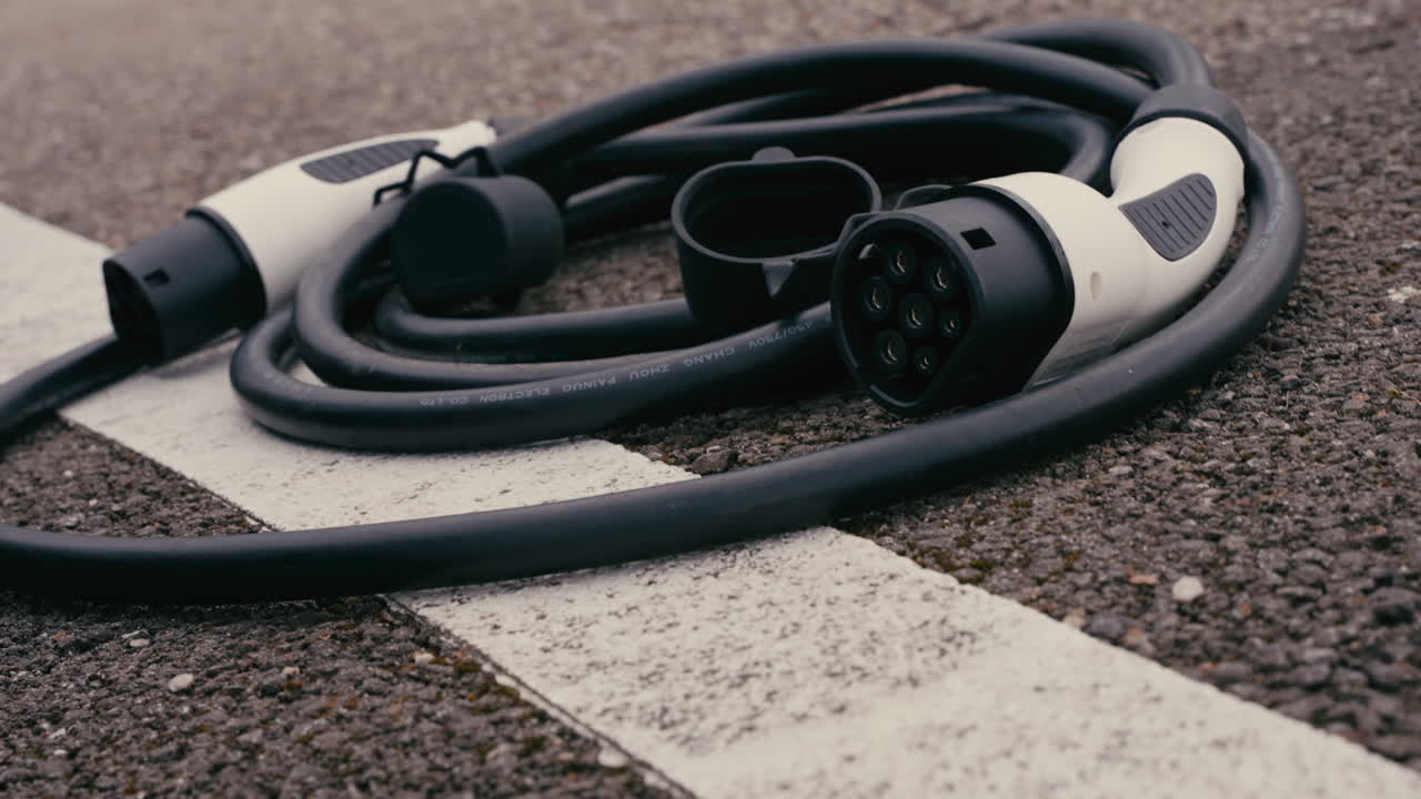 Electric Vehicle Charging Cable on the Ground