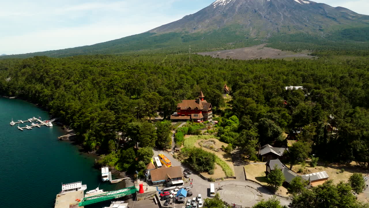 Petrohué port on Todos los Santos Lake, Osorno Volcano and beautiful landscape in Vicente Pérez Rosales National Park, Chile. Aerial drone view