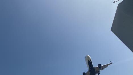 large passenger airplane landing at airport