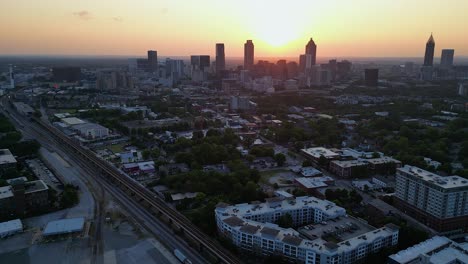 aerial view of atlanta georgia city skyline with golden sunset sky