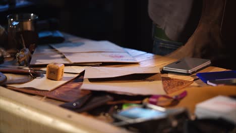 leather craftsman working on a project