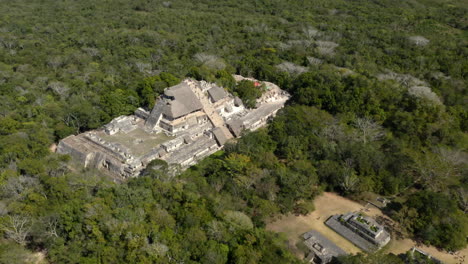 ancient maya city of ek balam with stone pyramid in mexican jungle