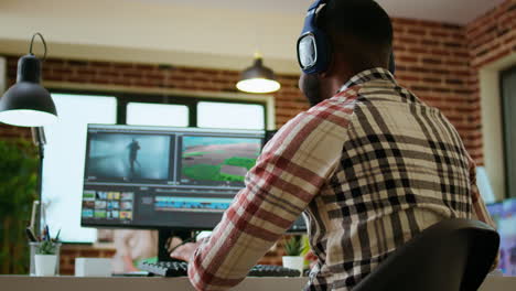 african american filmmaker editing a video shoot in post production