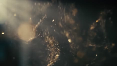 golden particles swirl in a beam of sunlight, creating a breathtaking spectacle filled with movement and beauty. this visual feast captures the interplay of light and shimmering dust.