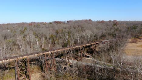 Aerial-Shot-Orbiting-the-Pope-Lick-Railroad-Trestle-in-Louisville-Kentucky-on-a-Bright,-Sunny-Afternoon