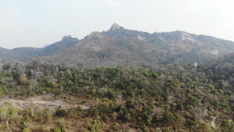 Aerial-shot-of-beautiful-forests-and-mountain-range-near-Maa-Kauleshwari-Temple,-Chatra,-Jharkhand,-India