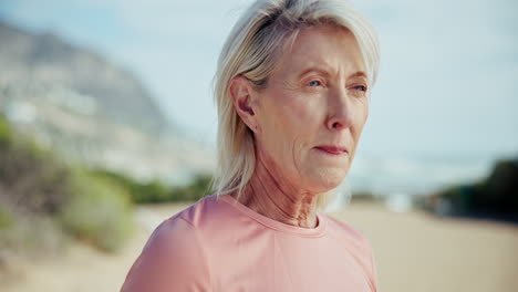 woman drinking water after exercise