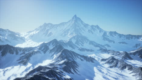 Aerial-View-from-Airplane-of-Blue-Snow-Covered-Canadian-Mountain-Landscape