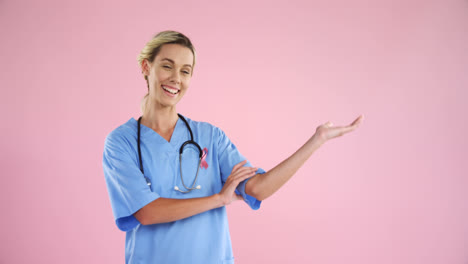 nurse in breast cancer awareness ribbon