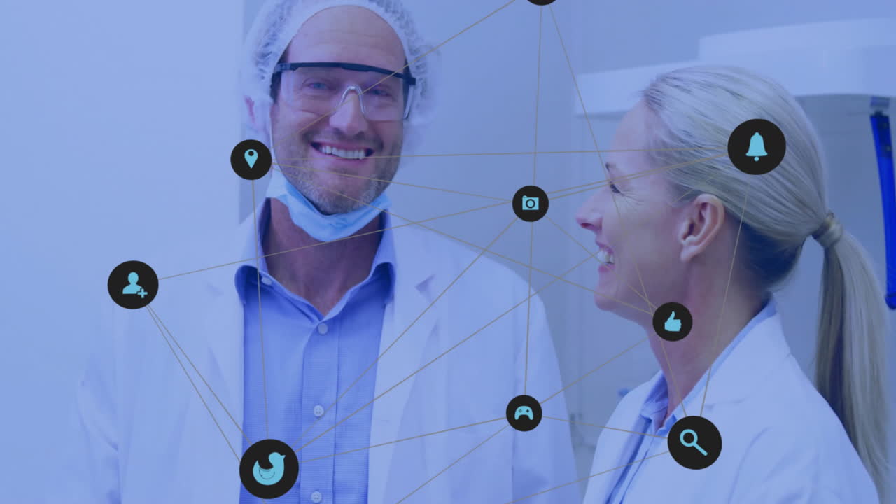 Network of medical icons animation over smiling doctors in hospital