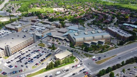 drone flying over shopping centre in mississauga on a sunny summer day