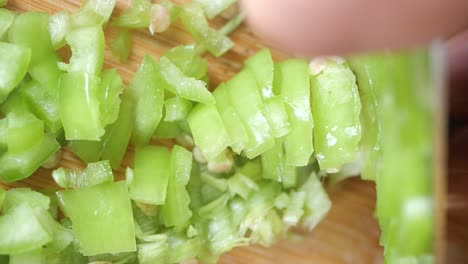 chopping green peppers