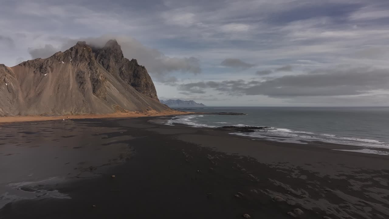 Aerial view of Vestrahorn and black sand beach at Stokksnes peninsula. Iceland