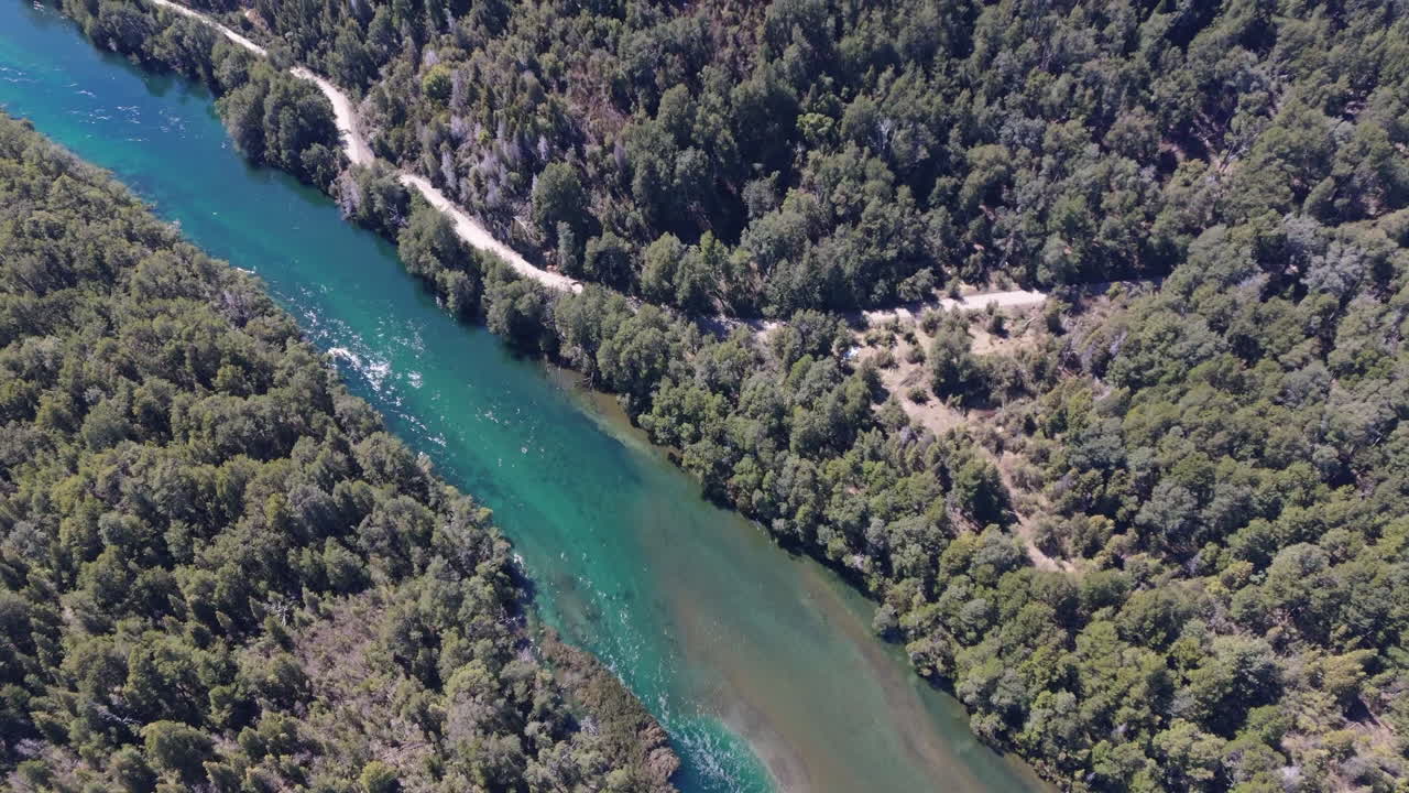 Stunning aerial view of the pristine Futaleufú River, also known as Río Grande or Río Azul, flowing through Los Alerces National Park, Patagonia, Argentina. Crystal-clear water and lush landscapes.