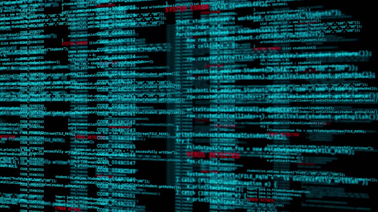 Computer screen with hacking warning message cybercrime concept system under attack software