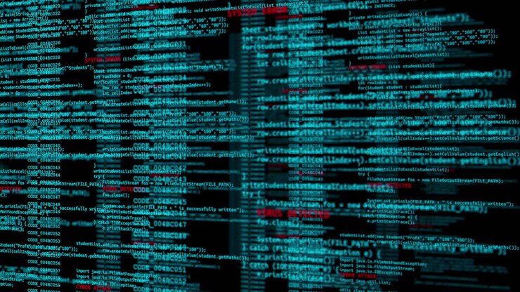 Computer screen with hacking warning message cybercrime concept system under attack software