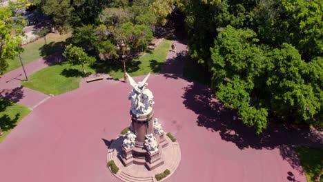 aerial view dolly out of the monument of france to argentina in the wealthy neighborhood of recoleta