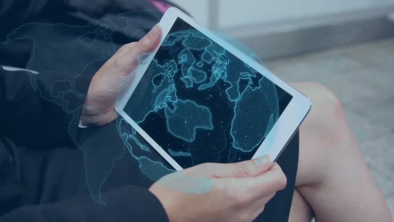 Animation of blue global network over businesswoman using tablet